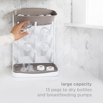 Ubbi Vertical Baby Bottle Drying Rack, Space Saving Countertop Bottle Dryer | 13-Peg Bottle Drying Rack Removable Drain Tray, Baby Organizer for Pump Parts, Pacifier & Accessories, Dishwasher Safe, Taupe
