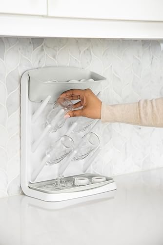 Ubbi Vertical Baby Bottle Drying Rack, Space Saving Countertop Bottle Dryer | 13-Peg Bottle Drying Rack Removable Drain Tray, Baby Organizer for Pump Parts, Pacifiers & Accessories, Dishwasher Safe, Oat