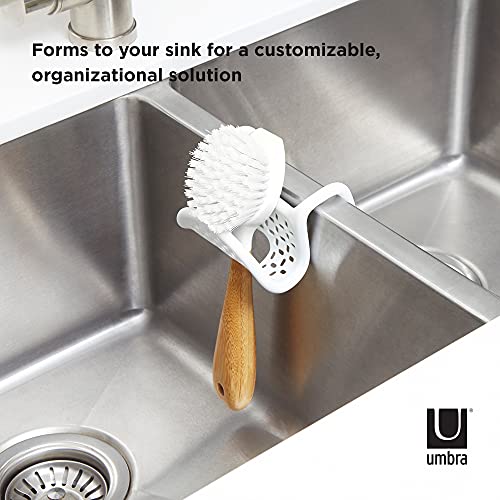 Umbra Sling Flexible Sink Caddy, Elastic Non-Slip Sponge Holder, White | Rubber material, perforated base for drainage, prevents moisture buildup, fits faucet necks, easy rinse clean
