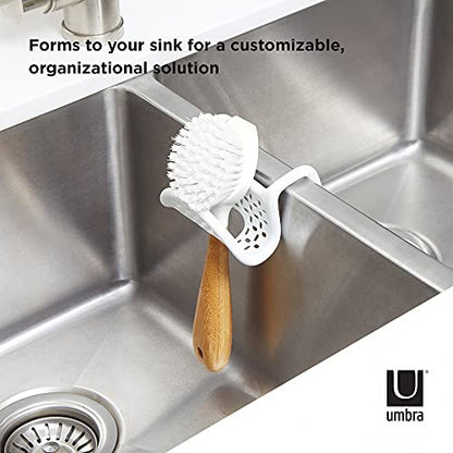 Umbra Sling Flexible Sink Caddy, Elastic Non-Slip Sponge Holder, White | Rubber material, perforated base for drainage, prevents moisture buildup, fits faucet necks, easy rinse clean