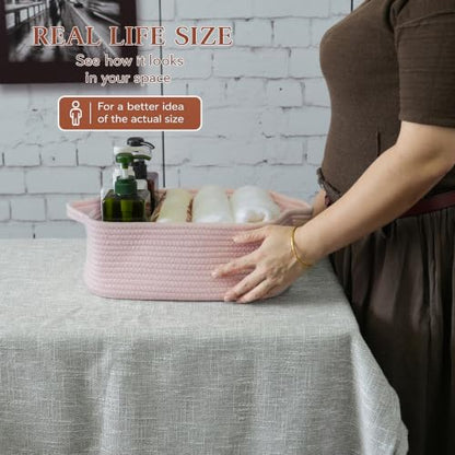 XUANGUO Medium Woven Cotton Rope Storage Basket with Handles, Light Pink | Small decorative rectangle storage bin for baby nursery items and cat toys; ideal as an empty gift basket or dog toy basket