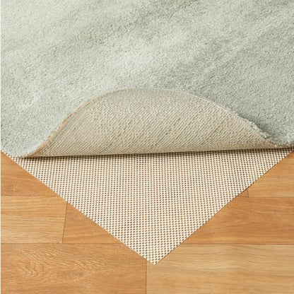 Amazon Basics Non-Slip Rug Pad, Keep Area Rugs Safe in Place, Slip and Skid Resistant Pads for Tile and Hardwood Floors, Protect Floors from Wear and Tear, Trimmable, 4x6