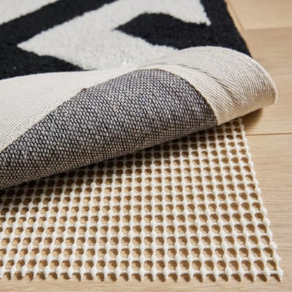 GORILLA GRIP® Strong Rug Pad Gripper, 2x6 FT, US Designed, Grips Help Keep Area Rugs Safe and in Place, Slip and Skid Resistant Pads for Hard Floors, Under Carpet Mat Cushion and Hardwood Protection