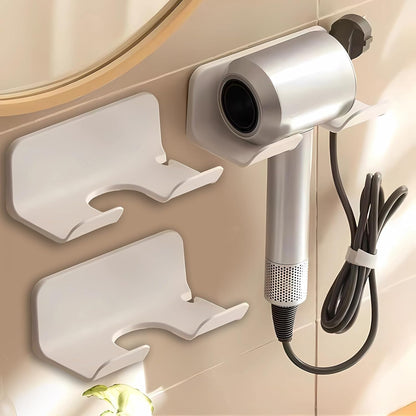2-Pack Universal Hair Dryer Holder, Self Adhesive Wall Mount, White | Universal storage rack fits most brand blow dryers, ideal for bathroom organization