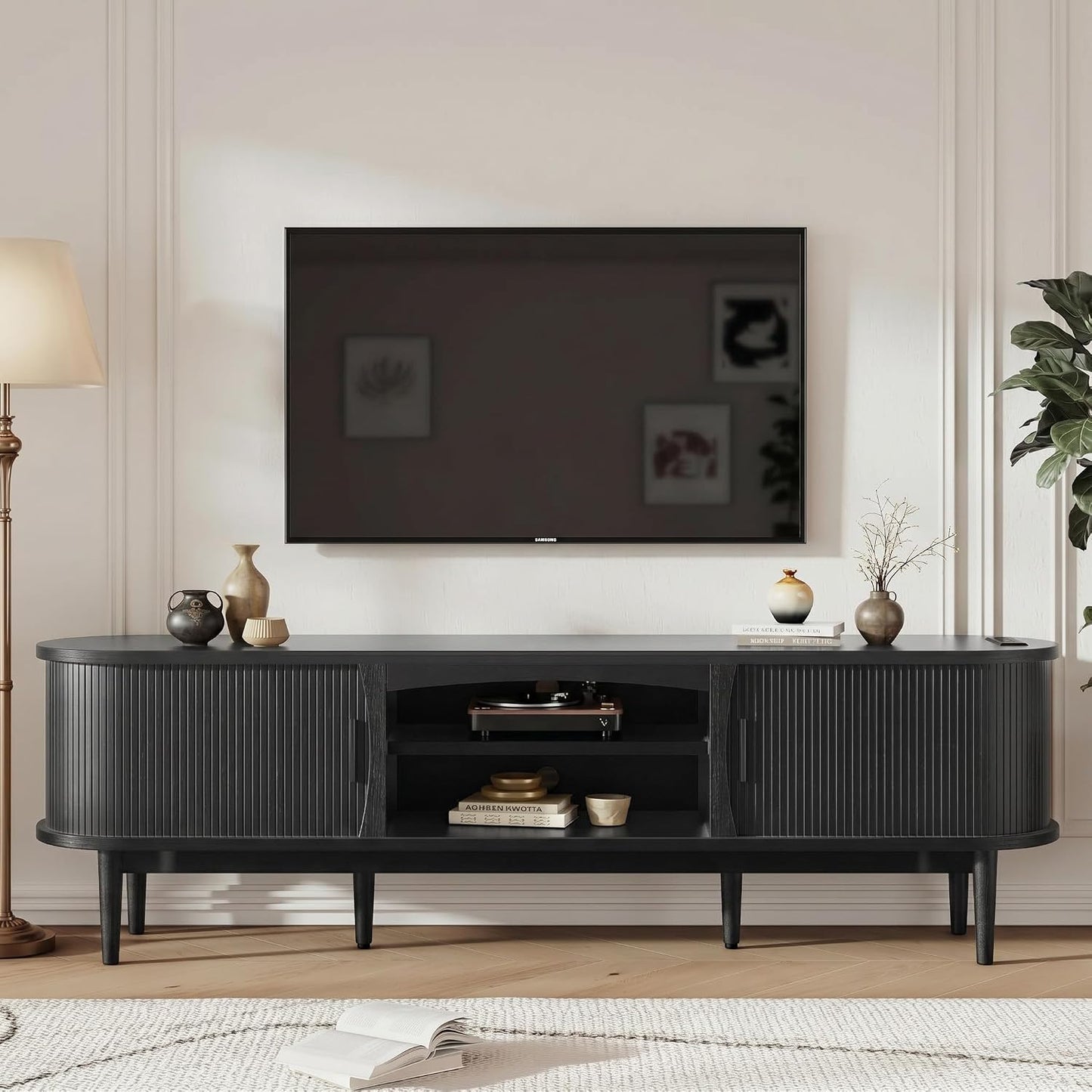 Decofy Mid Century TV Stand for TVs up to 90 Inches, Entertainment Center with Storage, Power Outlet, Fluted Sliding Doors & Adjustable Shelves, Modern Media TV Console Table for Living Room (Black)