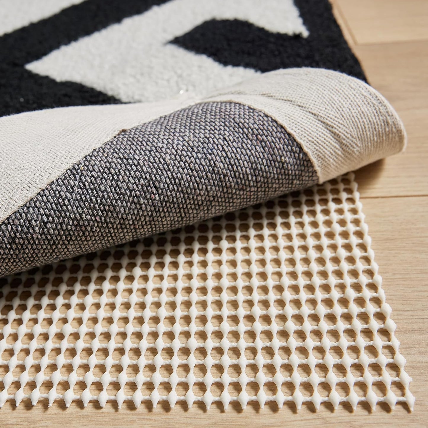 GORILLA GRIP® Strong Rug Pad Gripper, 2x6 FT, US Designed, Grips Help Keep Area Rugs Safe and in Place, Slip and Skid Resistant Pads for Hard Floors, Under Carpet Mat Cushion and Hardwood Protection